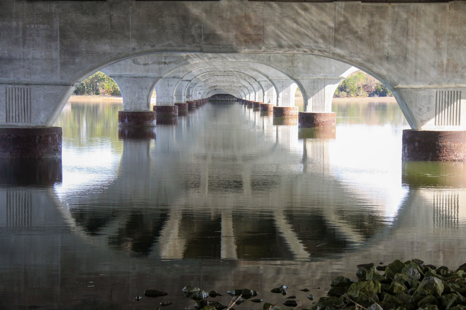 under the broad river