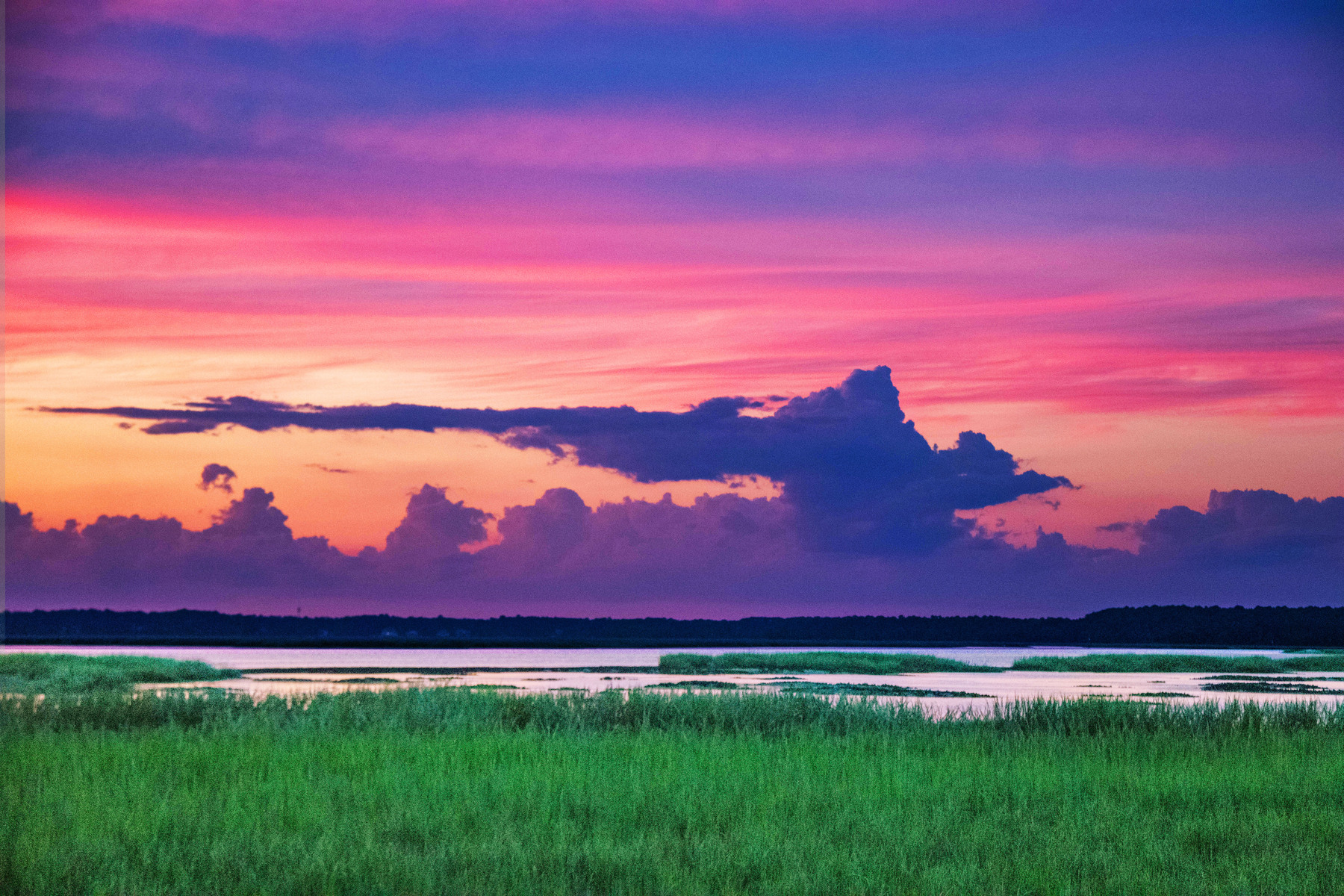 dragon flying at sunset