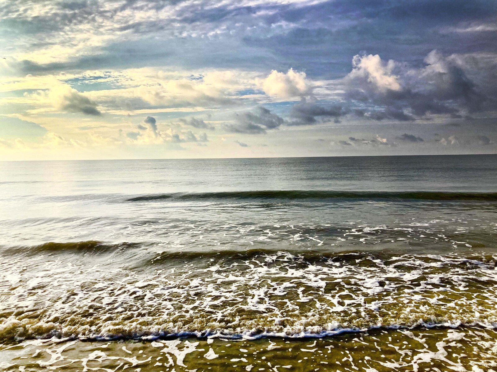 flat waves at sunrise